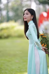 VGU No.151: Captivating Vietnamese Grace in Elegant Ao Dai Amidst Nature's Serenity - image 1