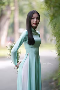 VGU No.151: Captivating Vietnamese Grace in Elegant Ao Dai Amidst Nature's Serenity - image 0