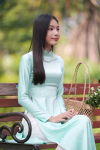VGU No.151: Captivating Vietnamese Grace in Elegant Ao Dai Amidst Nature's Serenity - image 2
