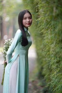 VGU No.151: Captivating Vietnamese Grace in Elegant Ao Dai Amidst Nature's Serenity - image 3