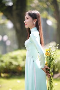 VGU No.151: Captivating Vietnamese Grace in Elegant Ao Dai Amidst Nature's Serenity - image 4