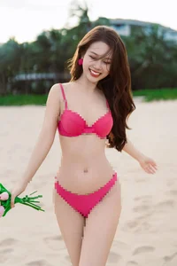 Summer Heat: Top Vietnamese Celebrities Showcase the Latest Bikini Trends and Fitness - image 8