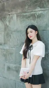 Charming Schoolgirl in Elegant Uniform: A Glimpse of Youthful Beauty - image 2