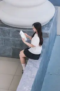 Charming Schoolgirl in Elegant Uniform: A Glimpse of Youthful Beauty - image 4