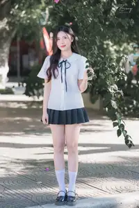 Charming Schoolgirl in Elegant Uniform: A Glimpse of Youthful Beauty - image 17