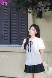 Charming Schoolgirl in Elegant Uniform: A Glimpse of Youthful Beauty - image 11