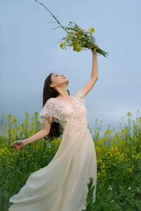 Ethereal Beauty: Xiao Yue Amidst Rapeseed Blooms in Art Language Vol.8948 - image 17