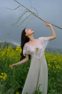 Ethereal Beauty: Xiao Yue Amidst Rapeseed Blooms in Art Language Vol.8948 - image 26
