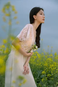 Ethereal Beauty: Xiao Yue Amidst Rapeseed Blooms in Art Language Vol.8948 - image 33