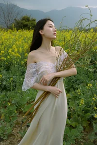 Ethereal Beauty: Xiao Yue Amidst Rapeseed Blooms in Art Language Vol.8948 - image 11