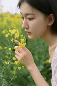 Ethereal Beauty: Xiao Yue Amidst Rapeseed Blooms in Art Language Vol.8948 - image 7