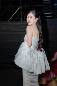 Radiant Beauty of the Yellow Ao Dai at Night - image 4