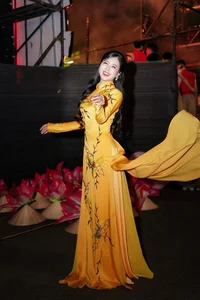 Radiant Beauty of the Yellow Ao Dai at Night - image 5
