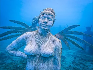 Exploring the Mystical Underwater Statue Forest: A Unique Submerged Art Gallery - image 6