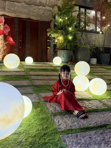 Celebrity Daughters Shine in Traditional Red Ao Dai for Festive Season - image 0