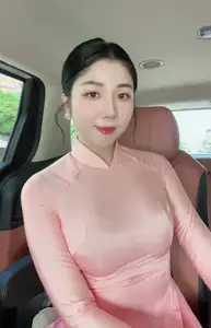 Elegant Pink Ao Dai Beauty: Gentle Charm of Vietnamese Women Captivates Every Gaze. - image 3