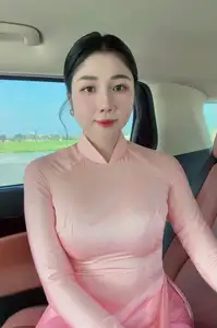 Elegant Pink Ao Dai Beauty: Gentle Charm of Vietnamese Women Captivates Every Gaze. - image 0