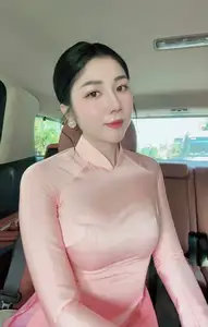 Elegant Pink Ao Dai Beauty: Gentle Charm of Vietnamese Women Captivates Every Gaze. - image 1