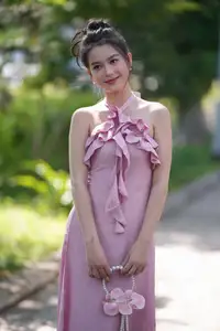 Gentle Charm: A Girl in an Elegant Pink Dress Amidst Nature's Embrace - image 9