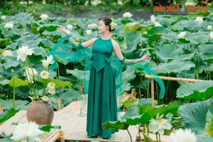 Graceful Beauty Queen in Traditional Yem Dress Amidst Early Season Lotus Blooms - image 8