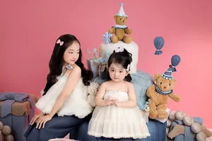 Anna and Lisa: The Adorable Doll-Like Daughters of Khanh Thi and Phan Hien - image 3