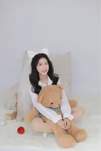 Sweet Moment: Adorable Girl & Her Beloved Teddy Bear - image 1