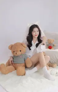 Sweet Moment: Adorable Girl & Her Beloved Teddy Bear - image 0