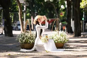 Vietnamese Ao Dai Beauty: Graceful girl with white daisies, an enchanting blend of tradition and charm. - image 10