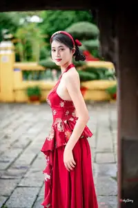 Elegant Asian Beauty in Red Dress Shines Gracefully Amidst a Traditional Garden 1000024509 - image 5