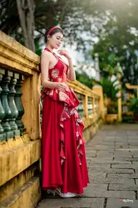 Elegant Asian Beauty in Red Dress Shines Gracefully Amidst a Traditional Garden 1000024509 - image 2