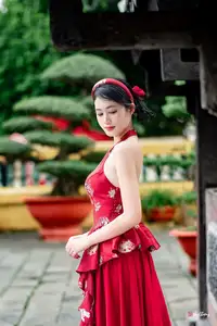 Elegant Asian Beauty in Red Dress Shines Gracefully Amidst a Traditional Garden 1000024509 - image 4