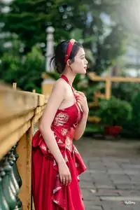 Elegant Asian Beauty in Red Dress Shines Gracefully Amidst a Traditional Garden 1000024509 - image 7