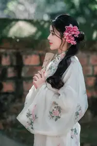 Discover the ethereal beauty of a Vietnamese girl exuding classic charm and gentle grace captivating every gaze - image 5