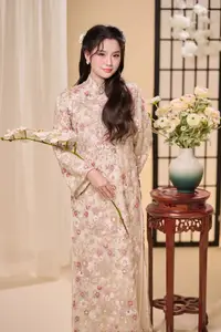 Graceful Vietnamese Woman Unveiled: Elegant Modern Ao Dai with Intricate Floral Patterns - image 5