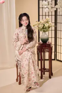 Graceful Vietnamese Woman Unveiled: Elegant Modern Ao Dai with Intricate Floral Patterns - image 12