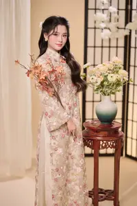 Graceful Vietnamese Woman Unveiled: Elegant Modern Ao Dai with Intricate Floral Patterns - image 11