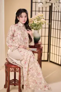 Graceful Vietnamese Woman Unveiled: Elegant Modern Ao Dai with Intricate Floral Patterns - image 14