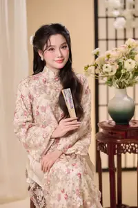Graceful Vietnamese Woman Unveiled: Elegant Modern Ao Dai with Intricate Floral Patterns - image 1