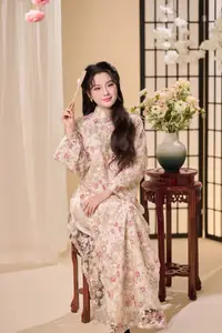 Graceful Vietnamese Woman Unveiled: Elegant Modern Ao Dai with Intricate Floral Patterns - image 7