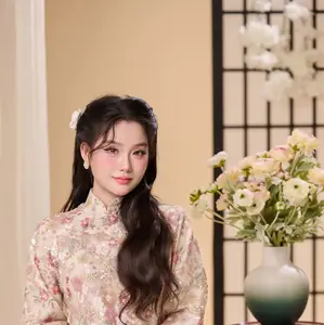 Graceful Vietnamese Woman Unveiled: Elegant Modern Ao Dai with Intricate Floral Patterns - image 3