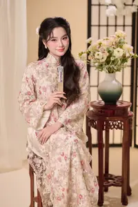 Graceful Vietnamese Woman Unveiled: Elegant Modern Ao Dai with Intricate Floral Patterns - image 10