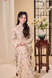 Graceful Vietnamese Woman Unveiled: Elegant Modern Ao Dai with Intricate Floral Patterns - image 13
