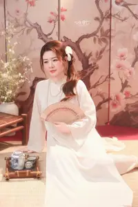 Graceful Asian Woman: Elegant Traditional Beauty in a Serene Tea Ceremony Moment. - image 4