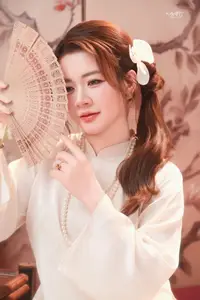 Graceful Asian Woman: Elegant Traditional Beauty in a Serene Tea Ceremony Moment. - image 7