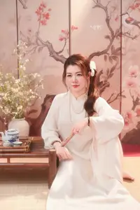 Graceful Asian Woman: Elegant Traditional Beauty in a Serene Tea Ceremony Moment. - image 2