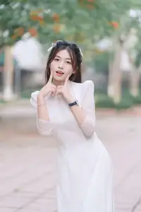 Discover the Elegant Beauty of a Vietnamese Young Woman in White Áo Dài 1000026883 - image 4