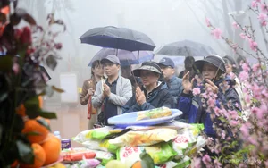 Spiritual Journey: Pilgrims Brave the Rain at Sacred Mountain Peaks to Collect Holy Water for Good Luck and Ancient Blessings - image 1