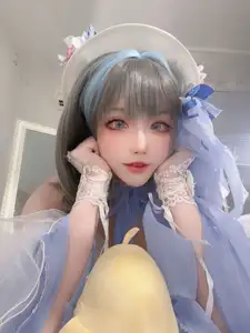 Coser Qi Si Kuai Wii - Enchanting Beauty in Elegant Cheshire Gown - A Masterpiece Cosplay. - image 22