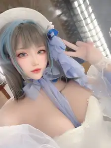 Coser Qi Si Kuai Wii - Enchanting Beauty in Elegant Cheshire Gown - A Masterpiece Cosplay. - image 3