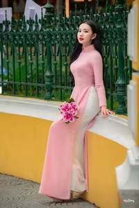 VGU No.158: Discover the Timeless Grace of Vietnamese Beauty in a Stunning Pink Ao Dai - image 1